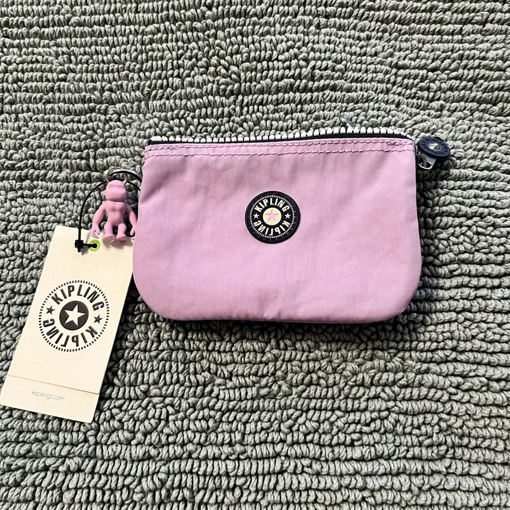 Kipling Small Creativity Wallet/Pouch - NWT
Color: Gentle Lilac